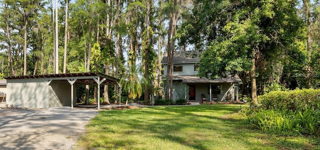 22004 Dupree Dr, Land O Lakes, FL 34639 - view of front of home with a front lawn and driveway