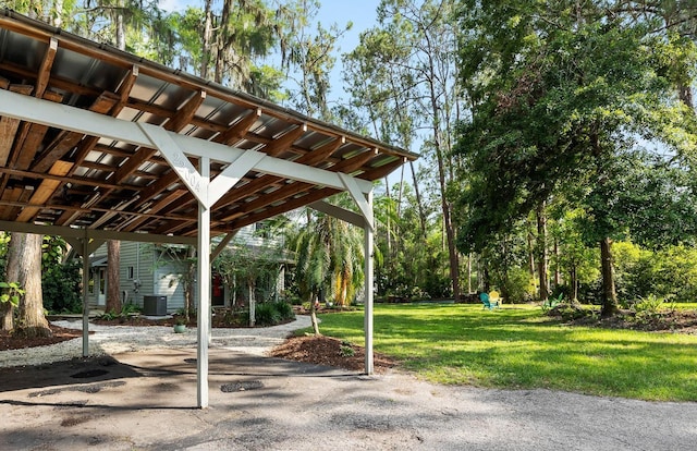 22004 Dupree Dr, Land O Lakes, FL 34639 - view of patio featuring cooling unit and a carport
