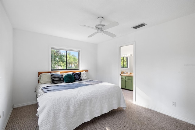 22004 Dupree Dr, Land O Lakes, FL 34639 - bedroom featuring multiple windows, light carpet, and baseboards