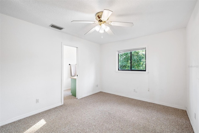 22004 Dupree Dr, Land O Lakes, FL 34639 - empty room featuring light colored carpet, ceiling fan, and baseboards