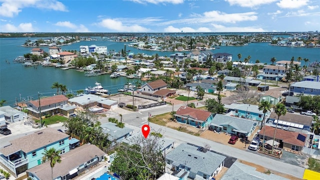 154 147th Ave E, Madeira Beach, FL 33708 - aerial perspective of suburban area featuring a large body of water