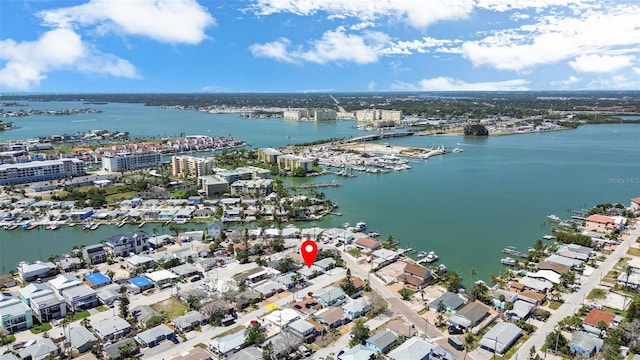 154 147th Ave E, Madeira Beach, FL 33708 - aerial overview of property's location featuring a nearby body of water, a marina, and nearby urban area