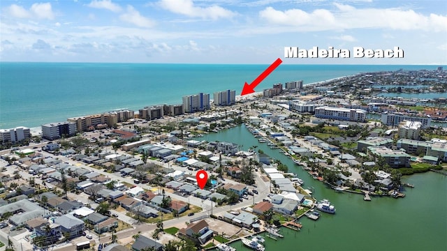 154 147th Ave E, Madeira Beach, FL 33708 - aerial view of property and surrounding area with a nearby body of water and nearby urban area