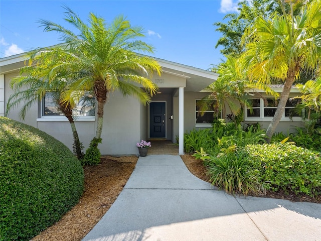 1701 38th St N, Saint Petersburg, FL 33713 - doorway to property with stucco siding