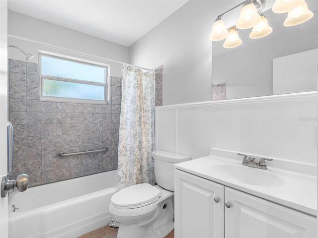 1701 38th St N, Saint Petersburg, FL 33713 - bathroom featuring toilet, shower / bath combo with shower curtain, a chandelier, and vanity