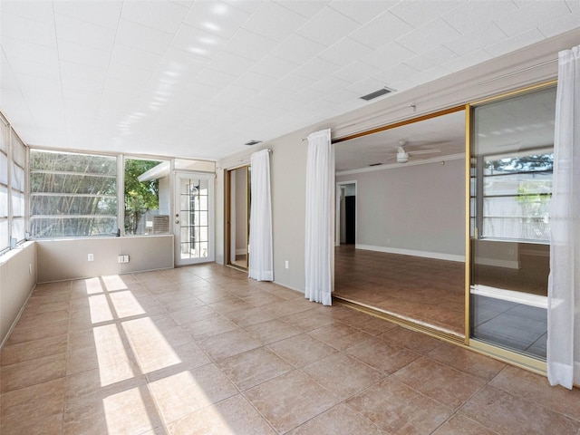 1701 38th St N, Saint Petersburg, FL 33713 - spare room with a ceiling fan and tile patterned flooring