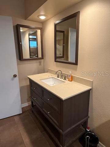 10811 Candlin Ct, Riverview, FL 33578 - bathroom with vanity and baseboards
