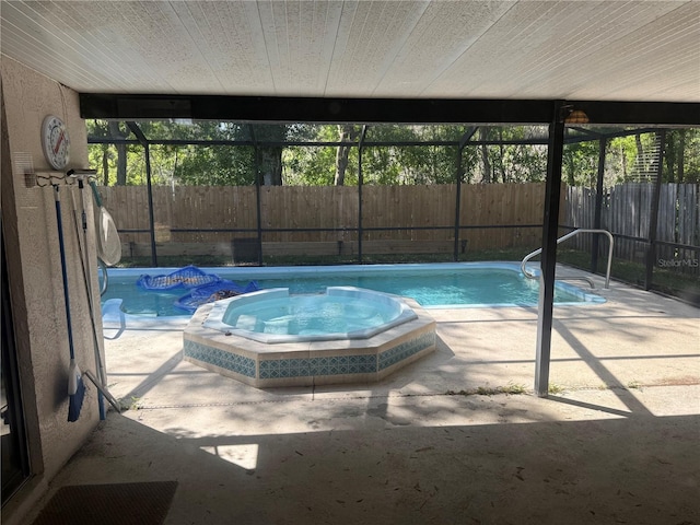 10811 Candlin Ct, Riverview, FL 33578 - view of pool featuring a fenced backyard, a pool with connected hot tub, and a patio