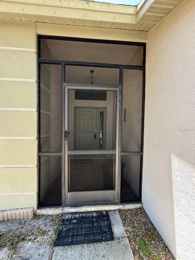10811 Candlin Ct, Riverview, FL 33578 - doorway to property featuring stucco siding