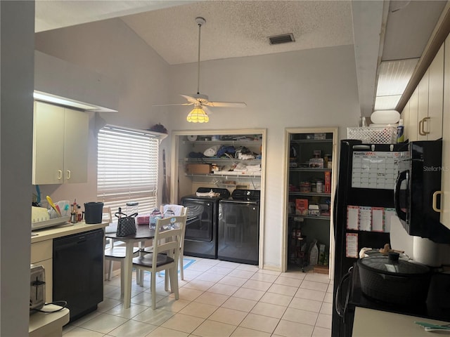 10811 Candlin Ct, Riverview, FL 33578 - kitchen with black dishwasher, washer and clothes dryer, light tile patterned flooring, and ceiling fan