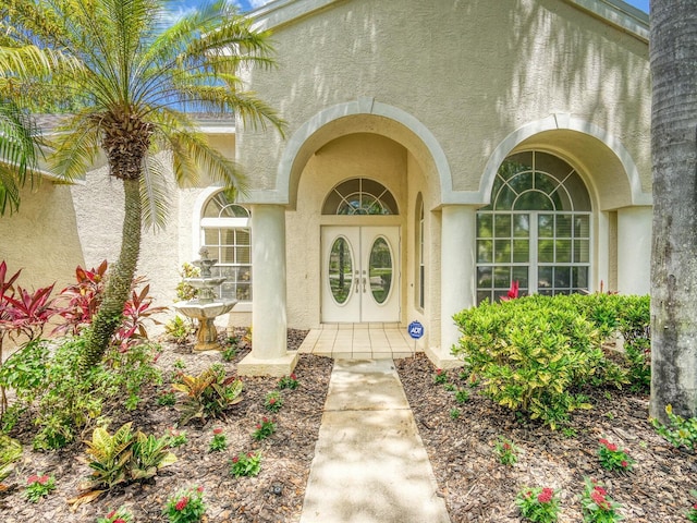 3910 Saywood Ct, Palm Harbor, FL 34685 - entrance to property with stucco siding
