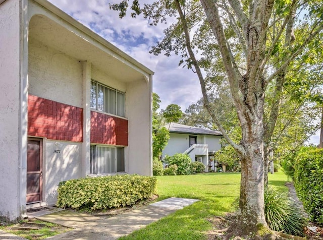 1877 Pine Cone Cir, Clearwater, FL 33760 - view of green lawn