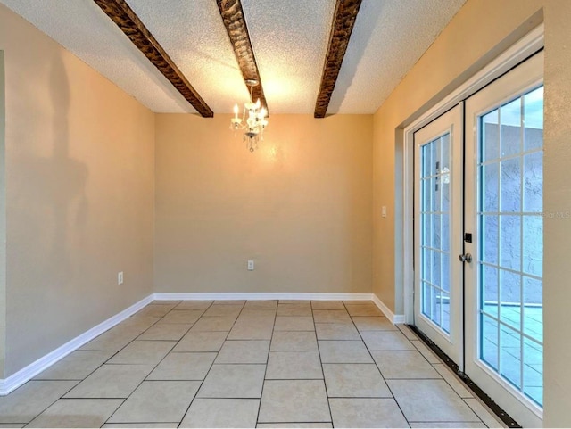 1877 Pine Cone Cir, Clearwater, FL 33760 - spare room featuring healthy amount of natural light, beam ceiling, a chandelier, a textured ceiling, and baseboards