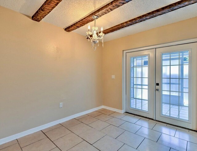 1877 Pine Cone Cir, Clearwater, FL 33760 - doorway to outside with french doors, beam ceiling, a chandelier, light tile patterned floors, and a textured ceiling