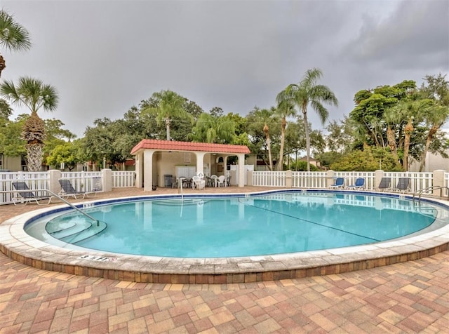 1877 Pine Cone Cir, Clearwater, FL 33760 - community pool with a patio