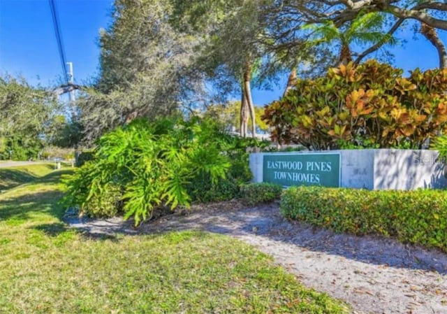 1877 Pine Cone Cir, Clearwater, FL 33760 - community / neighborhood sign featuring a lawn