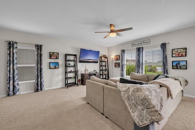 14643 Brumby Ridge Ave, Lithia, FL 33547 - living room with light carpet, ceiling fan, and baseboards