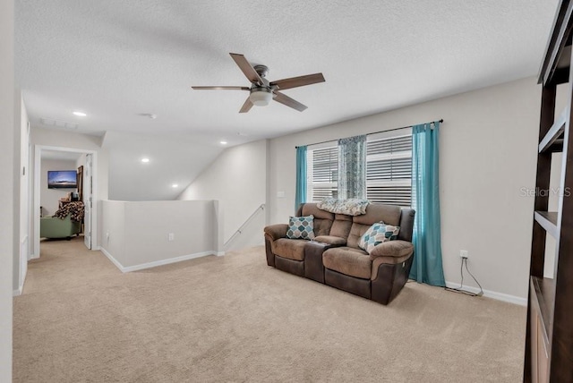 14643 Brumby Ridge Ave, Lithia, FL 33547 - living area featuring carpet floors, a ceiling fan, baseboards, a textured ceiling, and recessed lighting