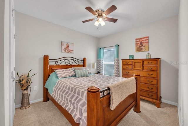 14643 Brumby Ridge Ave, Lithia, FL 33547 - bedroom with light carpet, baseboards, and ceiling fan