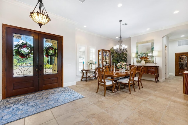 18258 Wayne Rd, Odessa, FL 33556 - entryway featuring arched walkways, french doors, ornamental molding, a chandelier, and recessed lighting