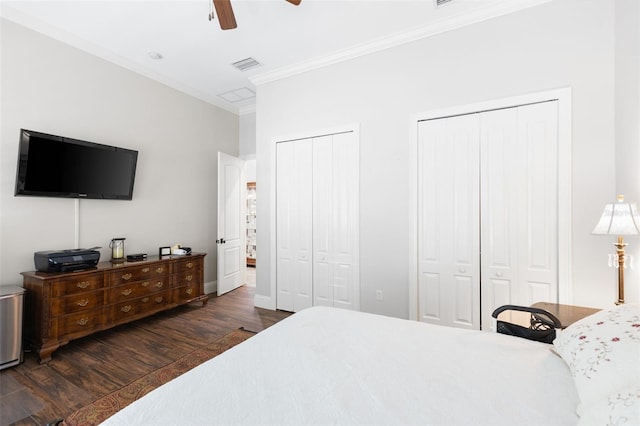 18258 Wayne Rd, Odessa, FL 33556 - bedroom with crown molding, multiple closets, wood finished floors, a ceiling fan, and baseboards