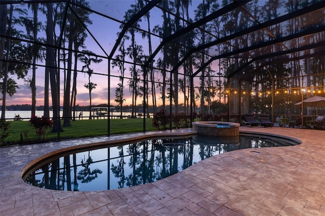 18258 Wayne Rd, Odessa, FL 33556 - view of swimming pool featuring a patio area, a water view, a pool with connected hot tub, glass enclosure, and a yard