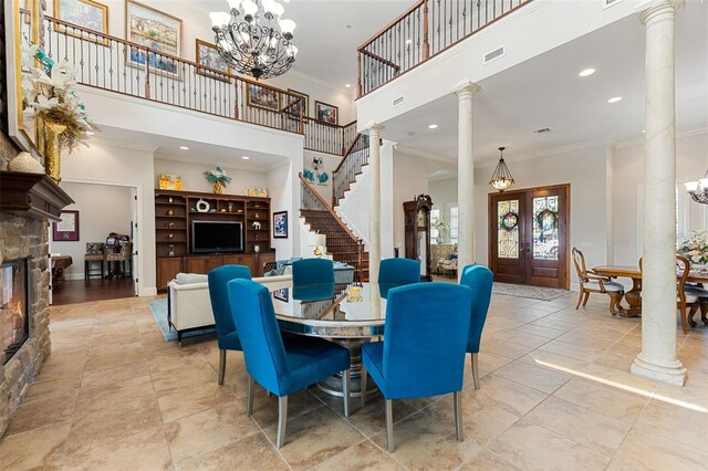 18258 Wayne Rd, Odessa, FL 33556 - dining area featuring a high ceiling, crown molding, a chandelier, decorative columns, and recessed lighting
