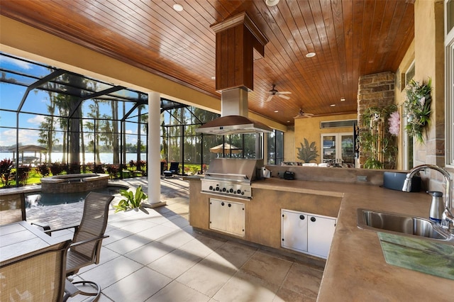 18258 Wayne Rd, Odessa, FL 33556 - view of patio / terrace featuring a sink, a ceiling fan, glass enclosure, a water view, and a pool with connected hot tub