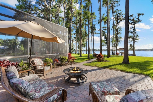 18258 Wayne Rd, Odessa, FL 33556 - view of patio / terrace with an outdoor fire pit and a water view