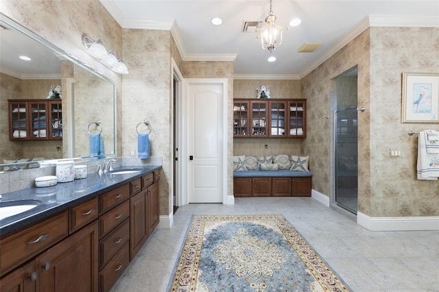 18258 Wayne Rd, Odessa, FL 33556 - full bath with double vanity, a chandelier, ornamental molding, an enclosed shower, and baseboards