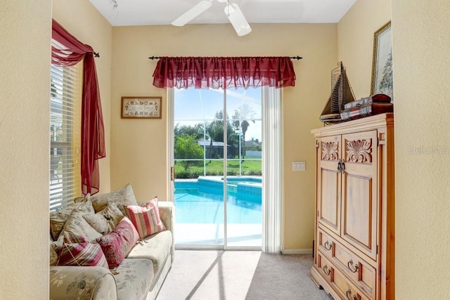 1212 Baycove Ln, Lutz, FL 33549 - sitting room featuring light colored carpet and a ceiling fan