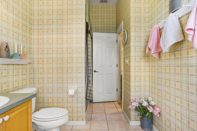1212 Baycove Ln, Lutz, FL 33549 - bathroom with vanity, toilet, and tile patterned floors