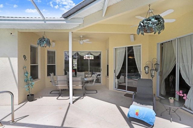 1212 Baycove Ln, Lutz, FL 33549 - view of patio / terrace featuring a ceiling fan and outdoor dining space