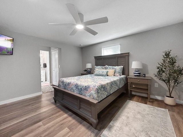 10011 46th Ave W, Bradenton, FL 34210 - bedroom with baseboards, wood finished floors, and a ceiling fan