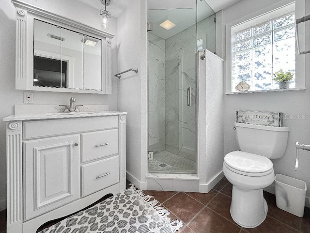 10011 46th Ave W, Bradenton, FL 34210 - bathroom with a marble finish shower, vanity, toilet, tile patterned flooring, and baseboards