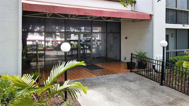2593 Countryside Blvd Unit 7305, Clearwater, FL 33761 - doorway to property featuring stucco siding