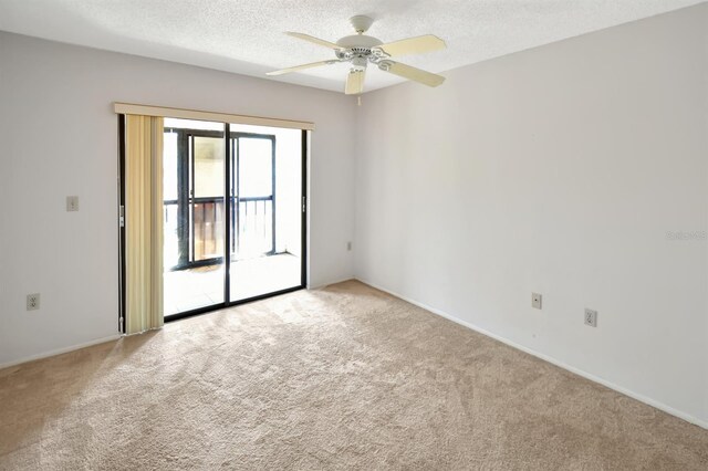 2593 Countryside Blvd Unit 7305, Clearwater, FL 33761 - empty room featuring light colored carpet, ceiling fan, a textured ceiling, and baseboards