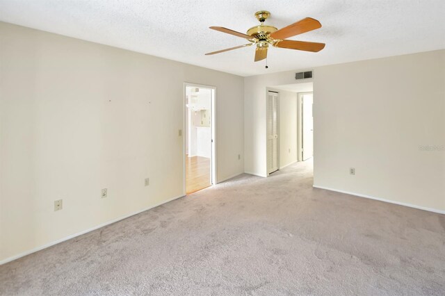 2593 Countryside Blvd Unit 7305, Clearwater, FL 33761 - empty room with light carpet, ceiling fan, and baseboards