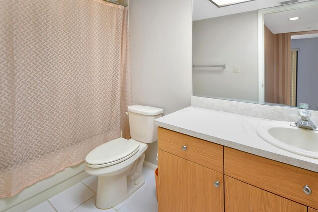 2593 Countryside Blvd Unit 7305, Clearwater, FL 33761 - full bath featuring toilet, vanity, and tile patterned flooring
