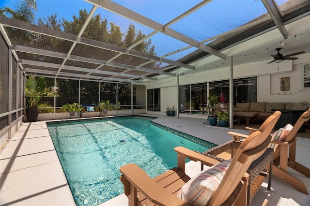 60 Lakeview Ct, Palm Harbor, FL 34683 - outdoor pool with a patio, an outdoor hangout area, ceiling fan, and glass enclosure