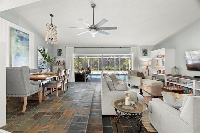 60 Lakeview Ct, Palm Harbor, FL 34683 - living area with lofted ceiling, ceiling fan, and stone tile floors
