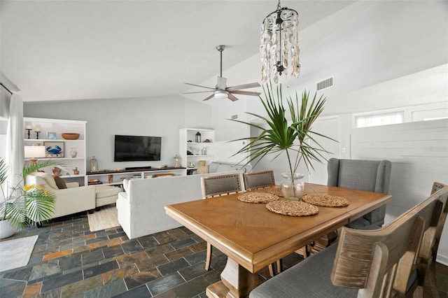 60 Lakeview Ct, Palm Harbor, FL 34683 - dining area with a ceiling fan, dark stone finish floors, and high vaulted ceiling