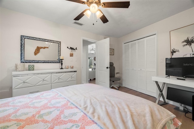 60 Lakeview Ct, Palm Harbor, FL 34683 - bedroom featuring wood finished floors, ceiling fan, a closet, and baseboards
