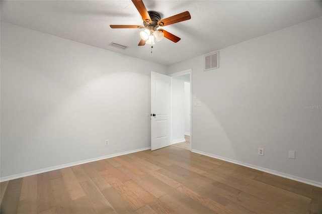 60 Lakeview Ct, Palm Harbor, FL 34683 - unfurnished room featuring ceiling fan, light wood-style flooring, and baseboards