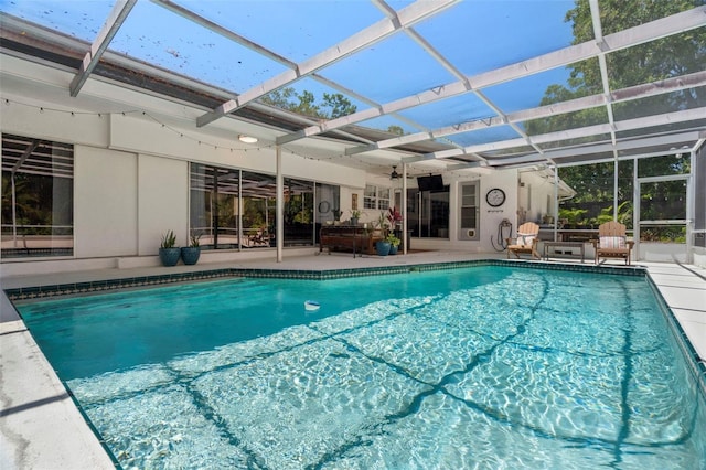 60 Lakeview Ct, Palm Harbor, FL 34683 - swimming pool with a patio, a ceiling fan, and a lanai