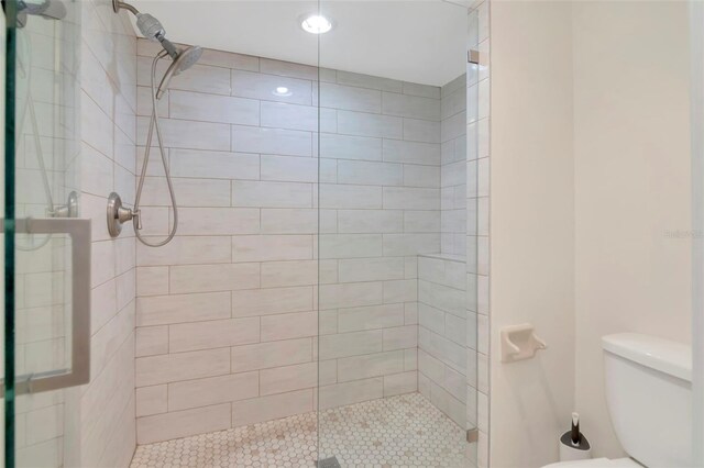 4234 Brentwood Park Cir, Tampa, FL 33624 - full bathroom with a shower stall and toilet