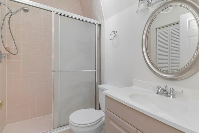 4234 Brentwood Park Cir, Tampa, FL 33624 - bathroom with a shower stall, vanity, and toilet