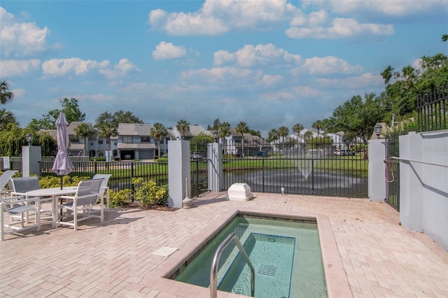 4234 Brentwood Park Cir, Tampa, FL 33624 - view of pool featuring a patio and a residential view