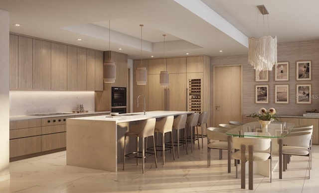 805 S Gulfview Blvd Unit 602A, Clearwater, FL 33767 - kitchen with modern cabinets, light marble finish floors, a large island, a sink, and recessed lighting
