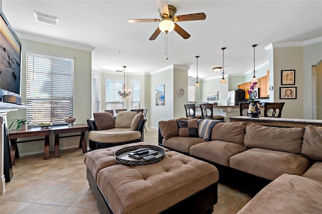 2773 Via Cipriani Unit 1310A, Clearwater, FL 33764 - living area with light tile patterned flooring, ornamental molding, a chandelier, a ceiling fan, and baseboards